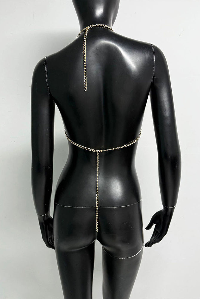 Gold metallic chain halter bra top back on mannequin with long center chain