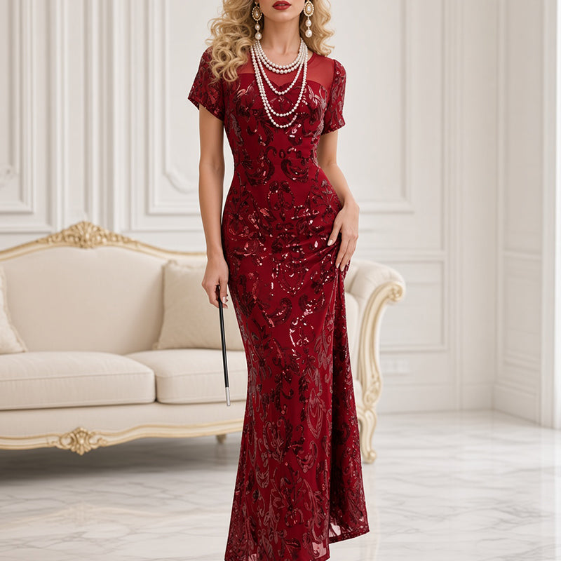 Red sequin maxi dress with high slit, short sleeves, fitted column silhouette