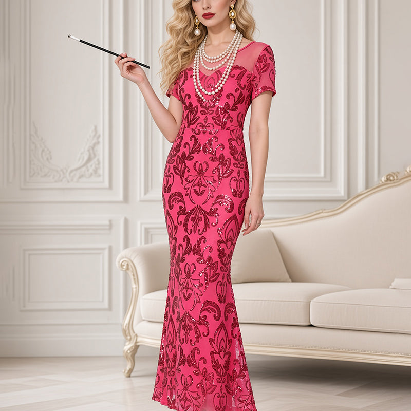 Pink sequin maxi dress with high slit, short sleeves, fitted column silhouette