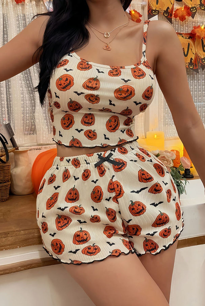 White crop cami and shorts pajama set with pumpkin and ghost print, black tie waist