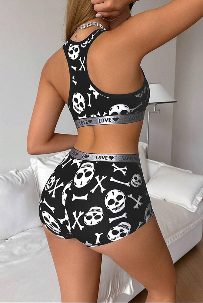 Black skull-print racerback sports bra and boyshorts lounge set, side back view