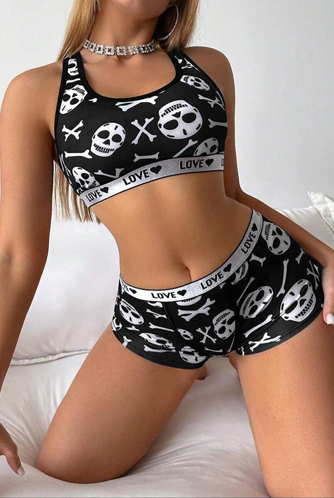 Black skull-print racerback sports bra and boyshorts lounge set, angled side view