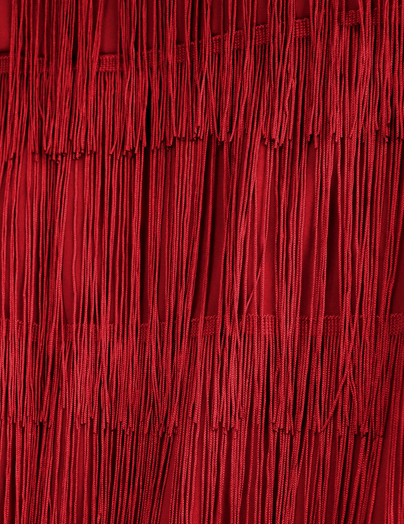 Red tiered fringe texture on a bodycon midi dress