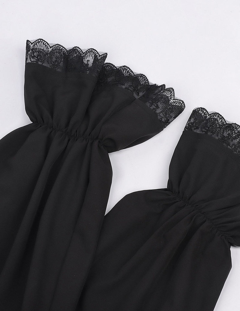 Black blouse sleeve with layered lace cuff and gathered puff at the wrist
