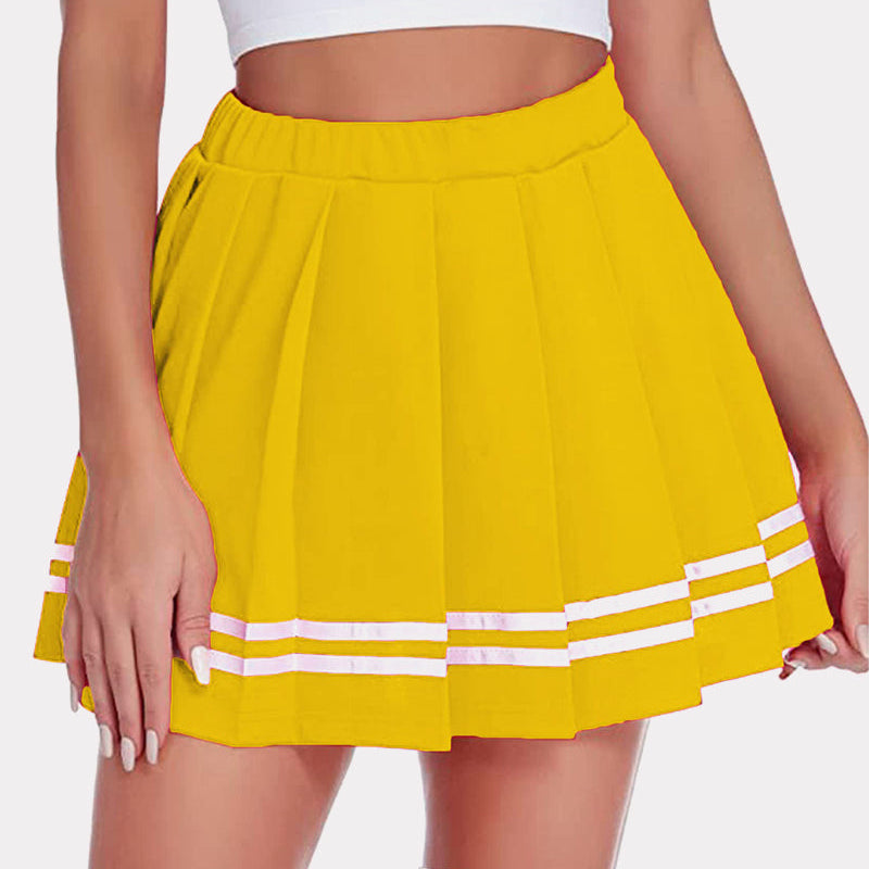 Yellow pleated mini skirt with white stripes. High-waisted school uniform style. Women's fashion.