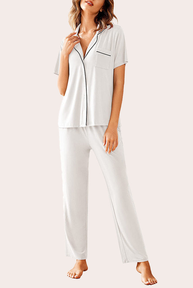 White pajama set for women: Short-sleeved button-down shirt and long pants, comfortable sleepwear.