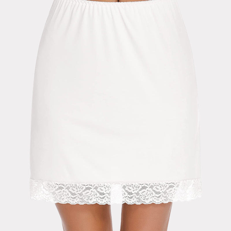 White half slip skirt with lace trim, above knee length. Elastic waist, comfortable lingerie.