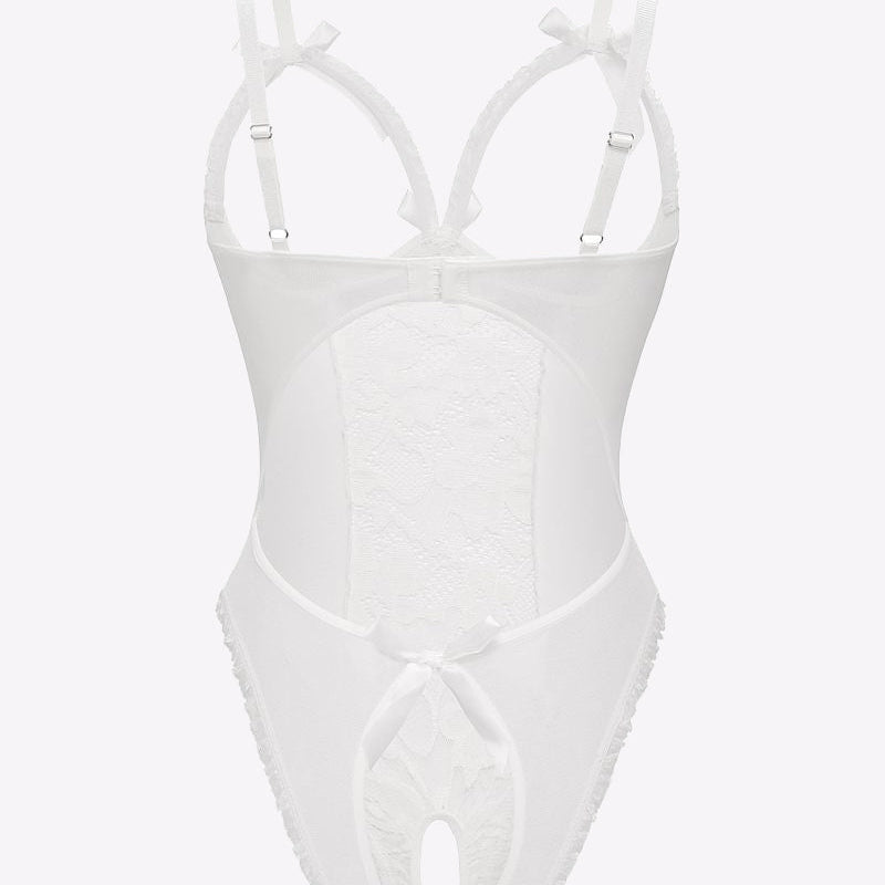 White lace cut-out bodysuit, bow details, adjustable straps, backless design. Sensual lingerie