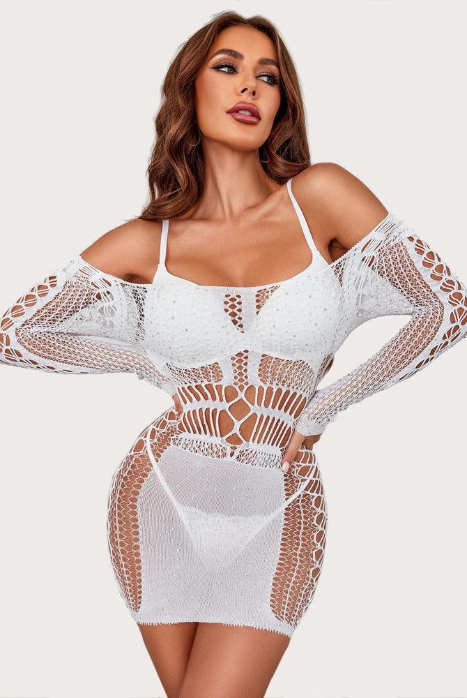 White fishnet rhinestone mini dress with long sleeves and lattice corset panels