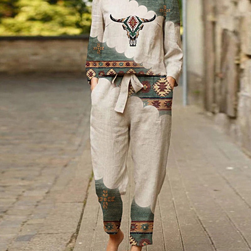 Beige linen two-piece tracksuit with bull skull print. Casual style for leisure and daily wear.