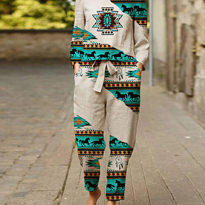 Beige linen two-piece print tracksuit with horse and geometric patterns. Casual style.