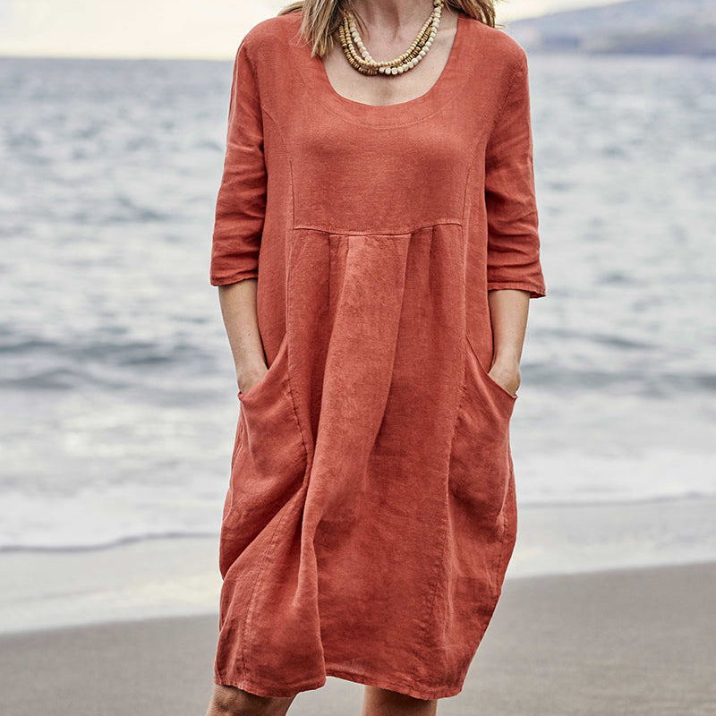 Rust-colored linen casual pocket dress with scoop neckline, perfect for leisure and daily wear.