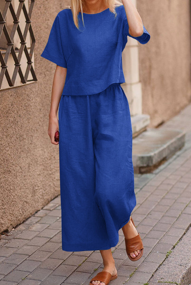 Blue loose fit two piece set for women. Comfortable linen top and wide leg pants, casual outfit.