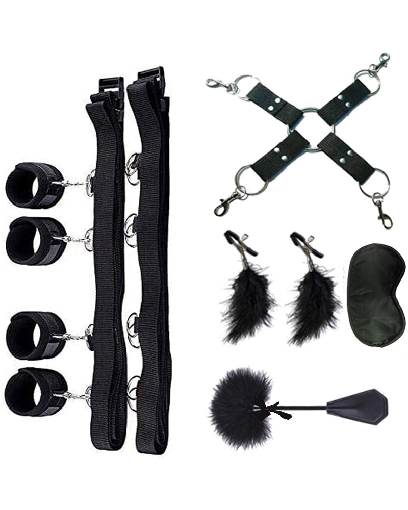 A BDSM kit with cuffs, straps, a blindfold, and feather ticklers.