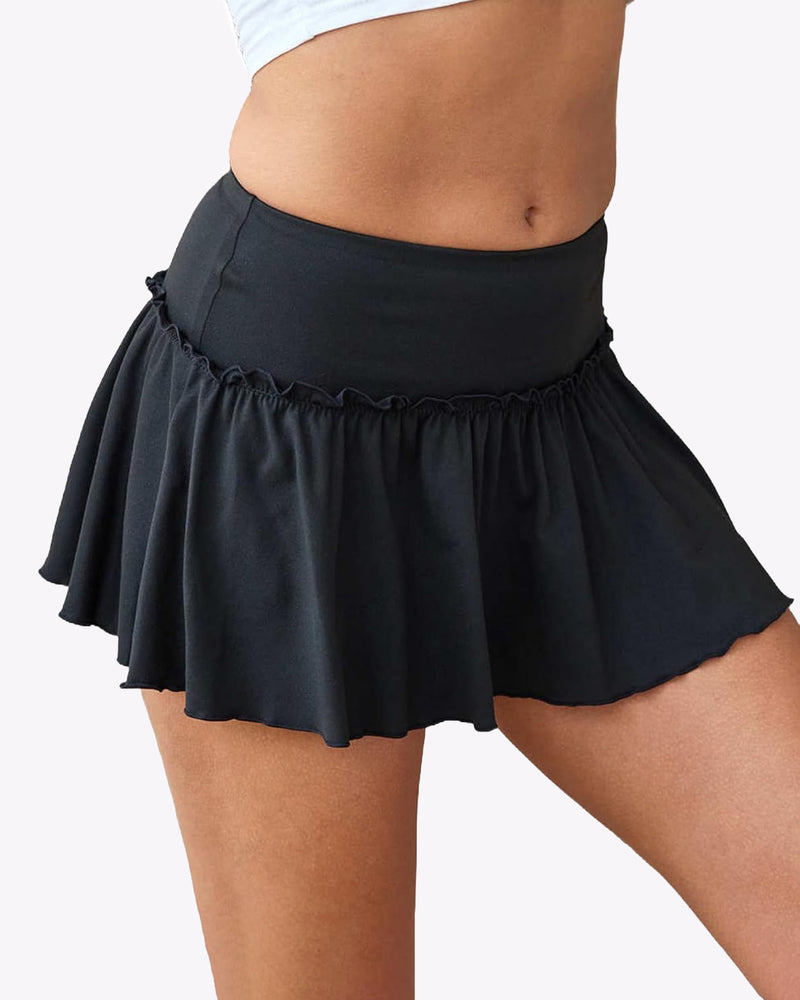 Flirty pink ruffle mini skirt with a comfortable waistband for a fun summer look.