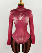 Pink spider web long-sleeve bodysuit with white spider graphic and front zipper seam.
