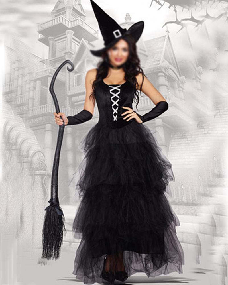 Black witch costume for Halloween: maxi dress, hat, gloves, and broom. Perfect for a spooky event.