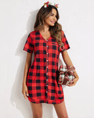 Red plaid button-down night shirt. Model with antlers holding gift, comfortable pajama dress.