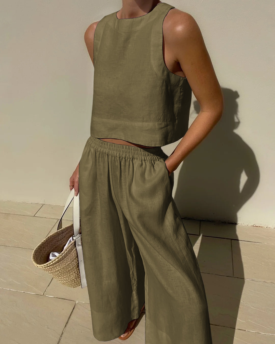 Olive green linen crop top and wide leg pants set. Vacation style, breathable summer outfit.