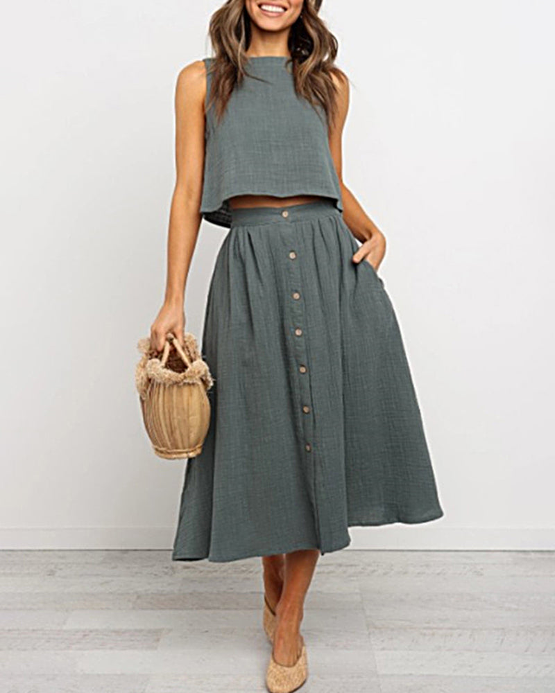 Green Short Vest Midi Skirt Set, two-piece outfit with button detail and woven handbag
