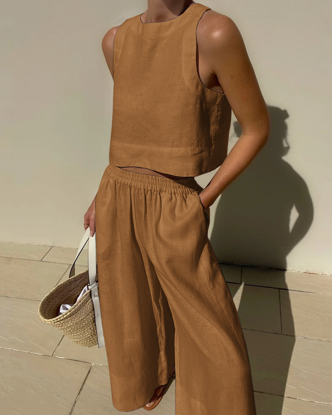 Brown linen crop top and wide leg pants set. Vacation style, breathable summer outfit.
