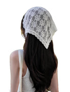 White lace triangle head scarf with scalloped edge, covering long hair