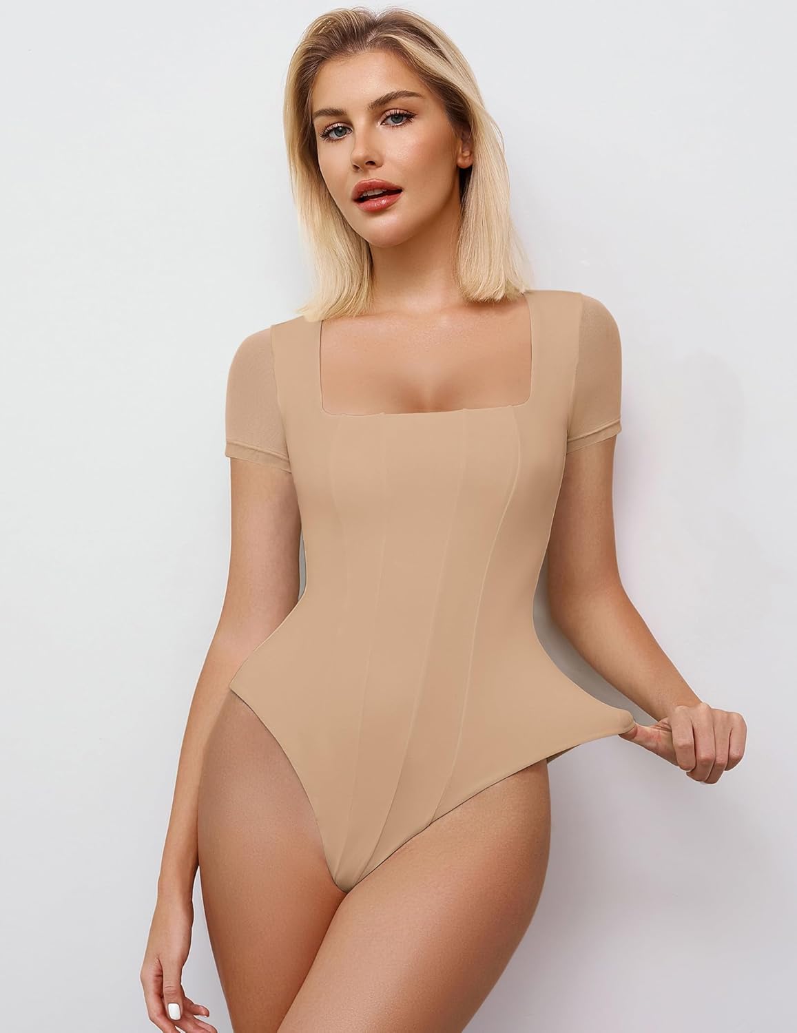 Beige square neck mesh bodysuit with short sleeves; perfect for a date night or going out ensemble.