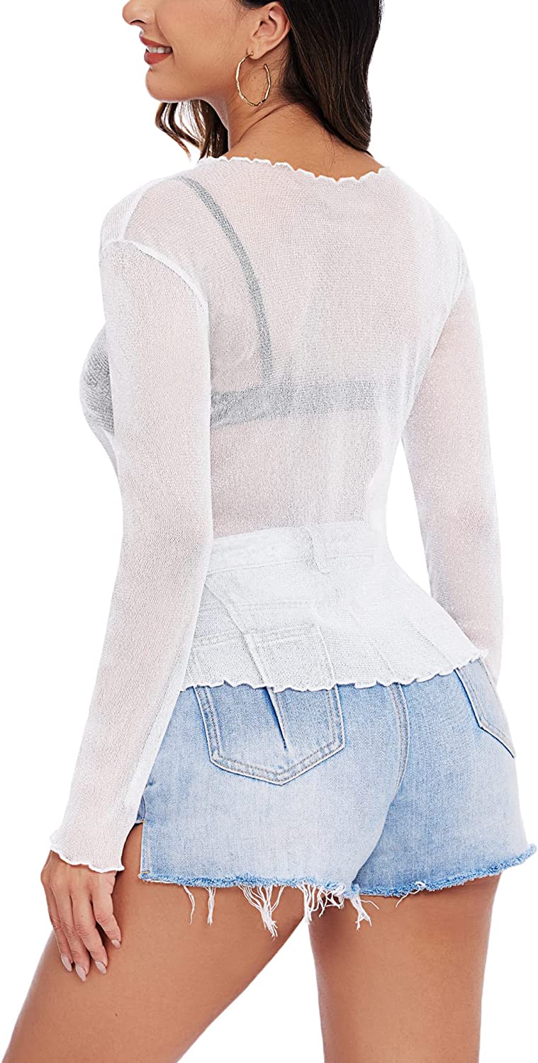 White mesh long sleeve see-through shirt and denim shorts. Stylish and sexy outfit for women.