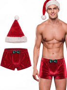 Red velvet men’s boxer shorts with matching Santa hat and pom-pom