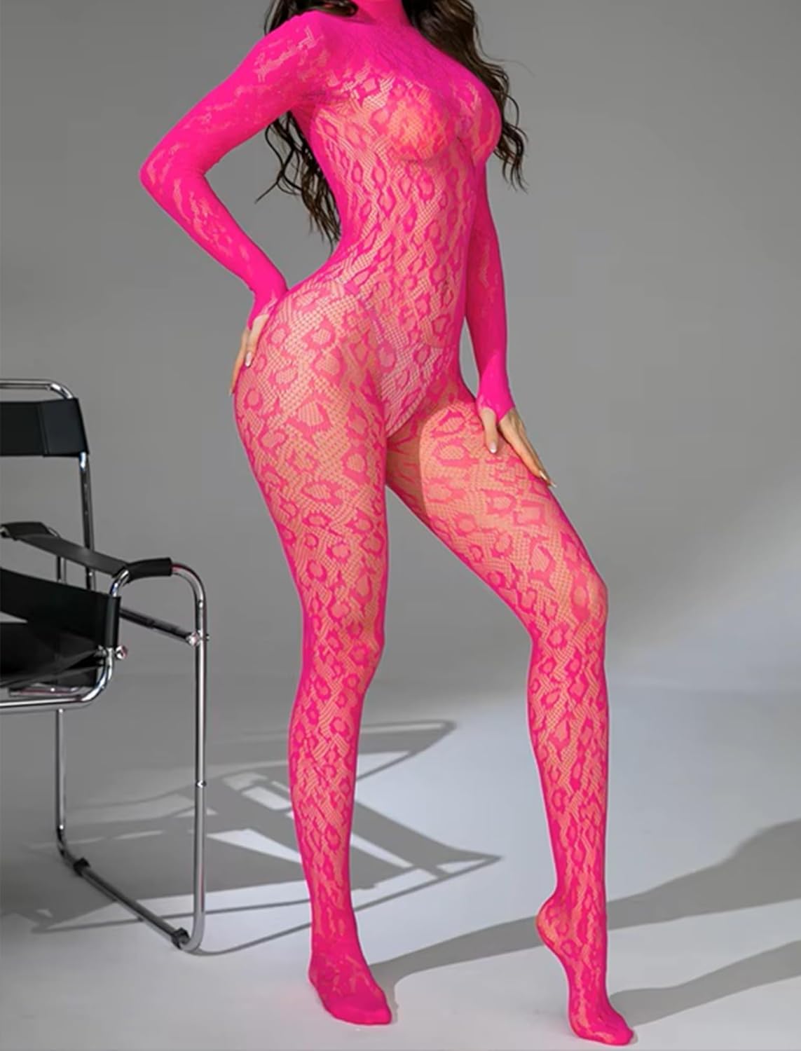 Pink snake-skin fishnet bodysuit for rave parties and date nights. Mock neck and long sleeves.