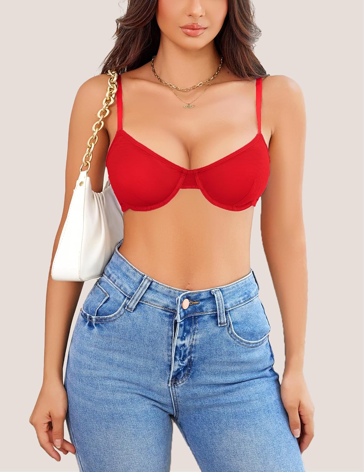 Red underwire bra, stylish lingerie, highlighting natural contours, with jeans; fashionable outfit