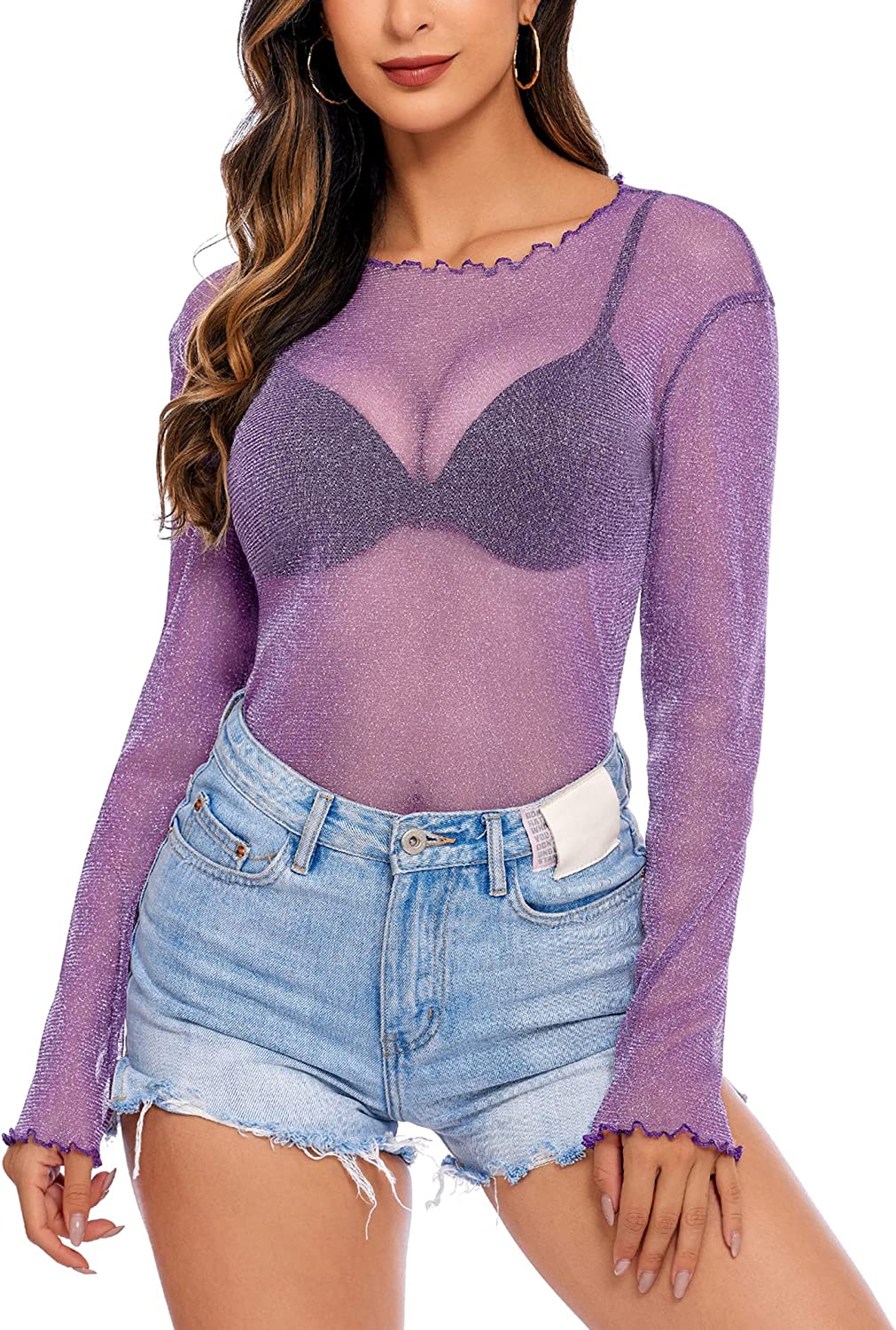 Purple mesh long sleeve top with denim shorts. A stylish and sensual outfit for a night out