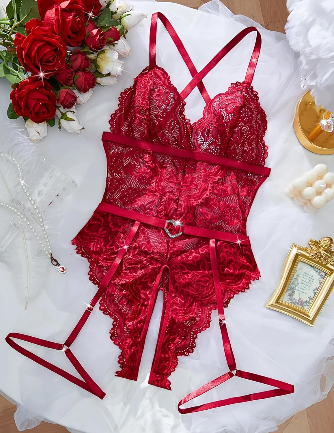 Red lace crotchless bodysuit with garter belt, adjustable straps, heart detail. Sexy lingerie.