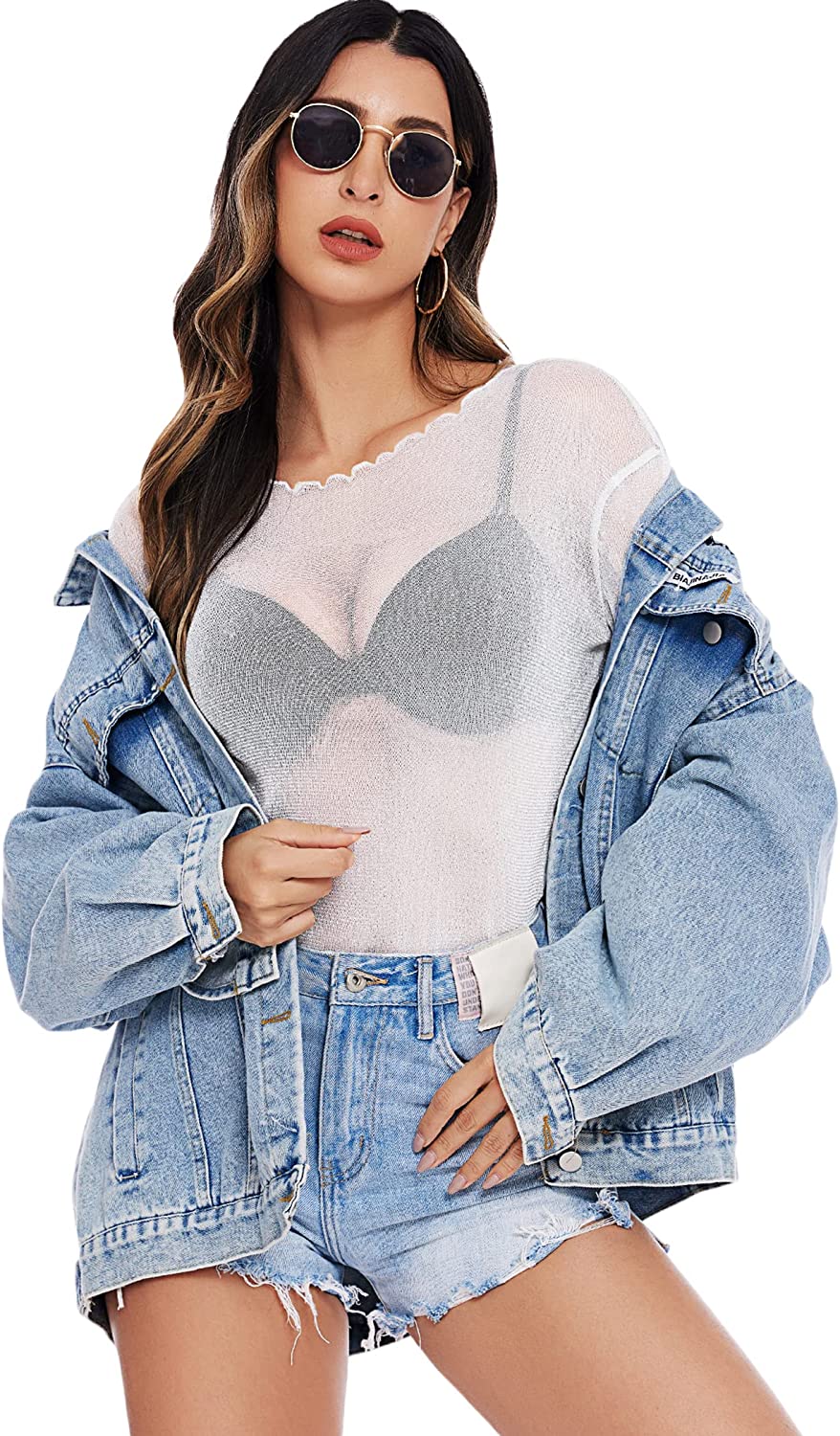 White mesh see-through long sleeve shirt with denim jacket and shorts. Stylish outfit for women.