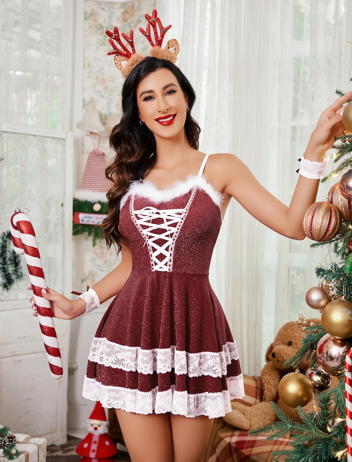 Red Christmas party dress with white lace trim and criss-cross front, ideal for holiday festivities.