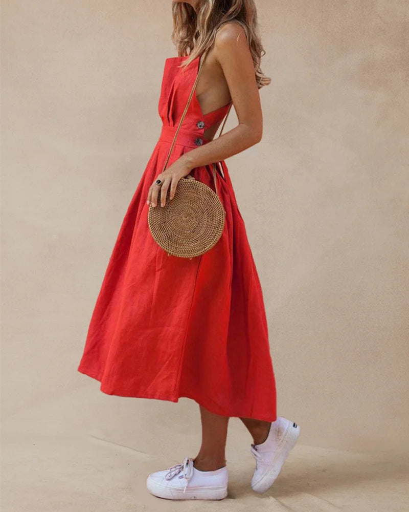 Red strap button waist pleated dress made of cotton and polyester, perfect for vacation