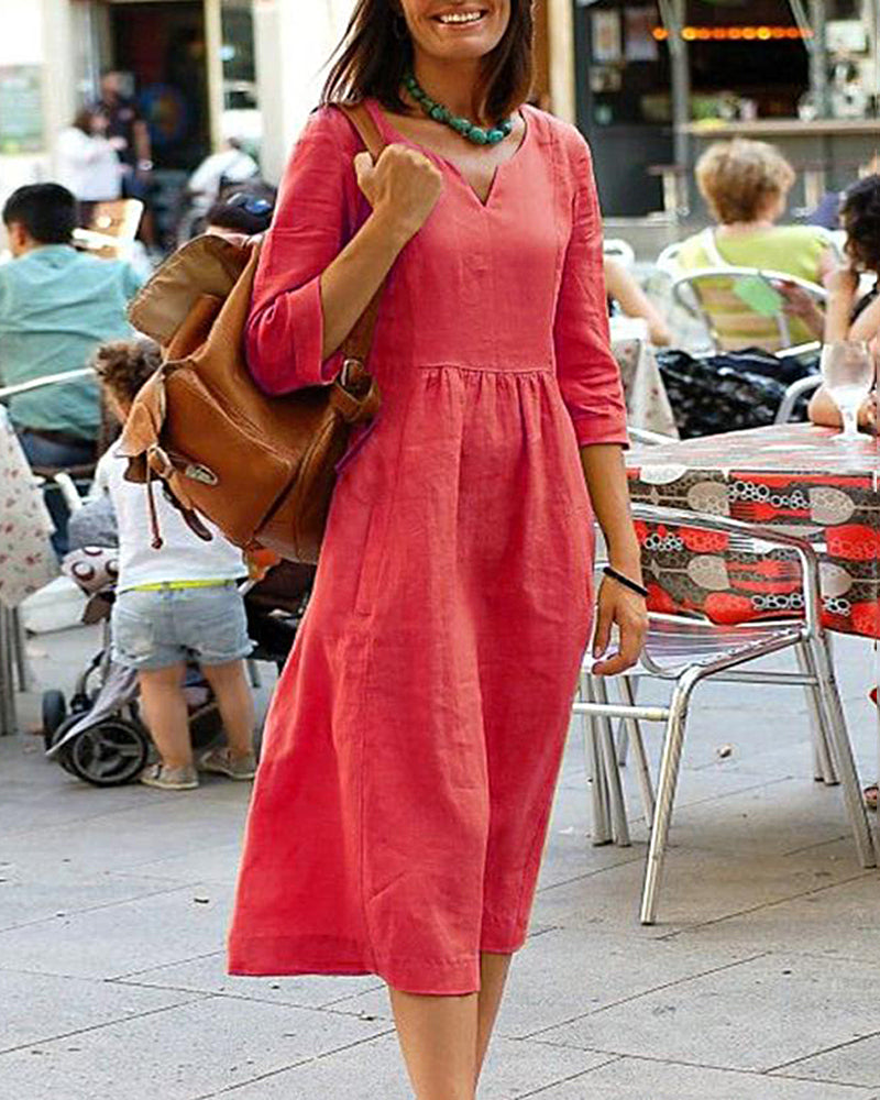 Coral cotton linen beach dress with V-neck and 3/4 sleeves, perfect for vacation style