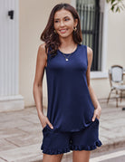 Navy sleeveless loungewear top and matching ruffle hem shorts set