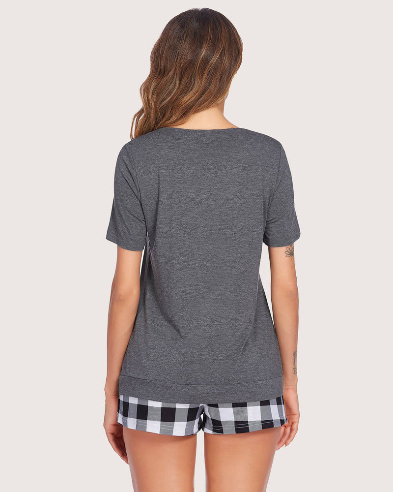 Gray top and plaid shorts pajama set for women. Comfortable and soft sleepwear for casual wear.