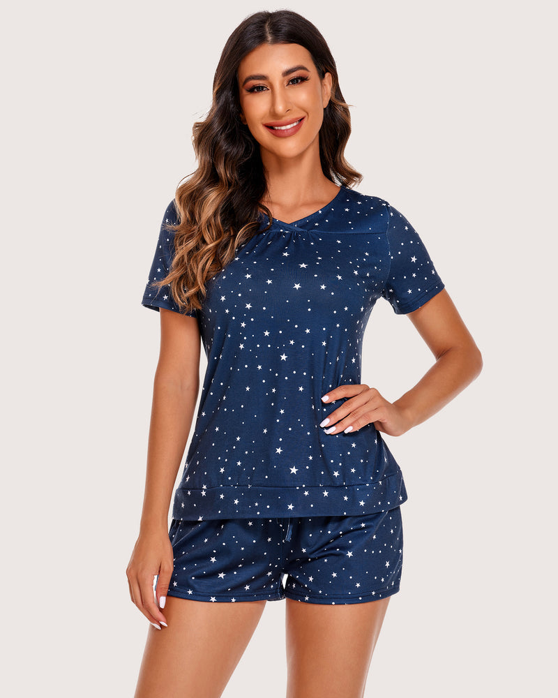 Navy blue star print shorts pajama set for women. Comfortable rayon sleepwear with V-neck top.