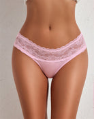 High-cut seamless panties in pink, blue, and beige with lace waistbands for women.