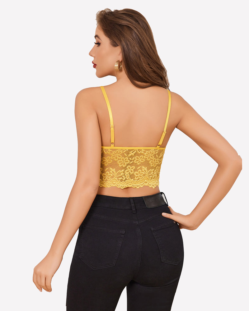 Yellow lace bralette crop top and black jeans. Sexy lingerie for women with adjustable straps.
