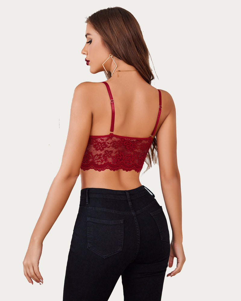 Burgundy lace bralette crop top with adjustable straps and black jeans. Sexy floral lace lingerie.