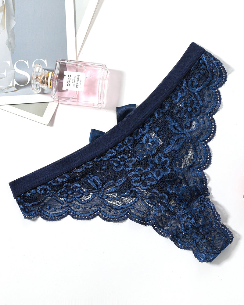 Dark blue lace bow thong panties. Low waist and floral lace design. Sexy lingerie for women.