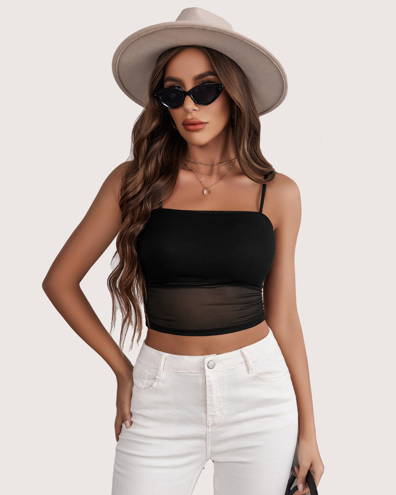 Black mesh spaghetti strap tank top, layered design, with white jeans, and hat for style.