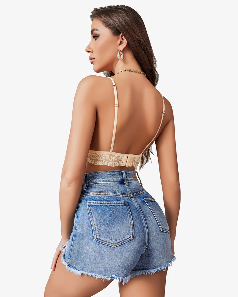 Beige lace bralette, paired with denim shorts, offering a confident and sexy look.