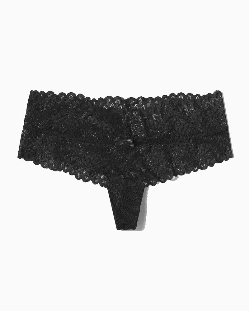 Black lace low-waist thong with floral pattern and bow, designed for comfort and a feminine touch.