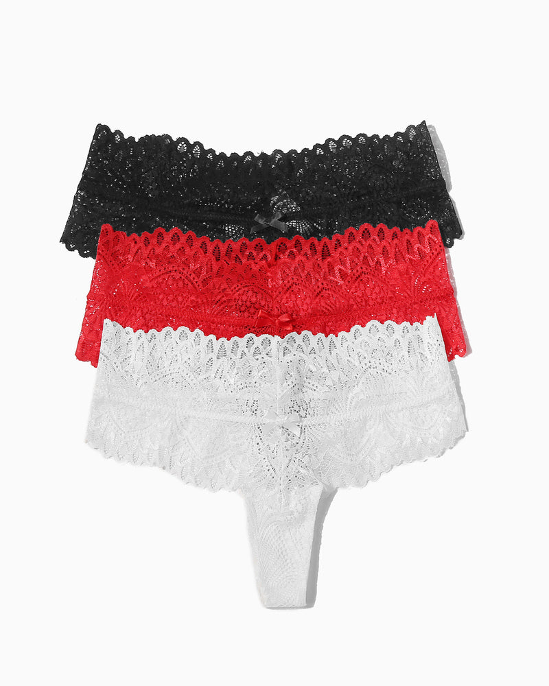 Set of three lace thongs in black, red, and navy with floral details and cute bows.