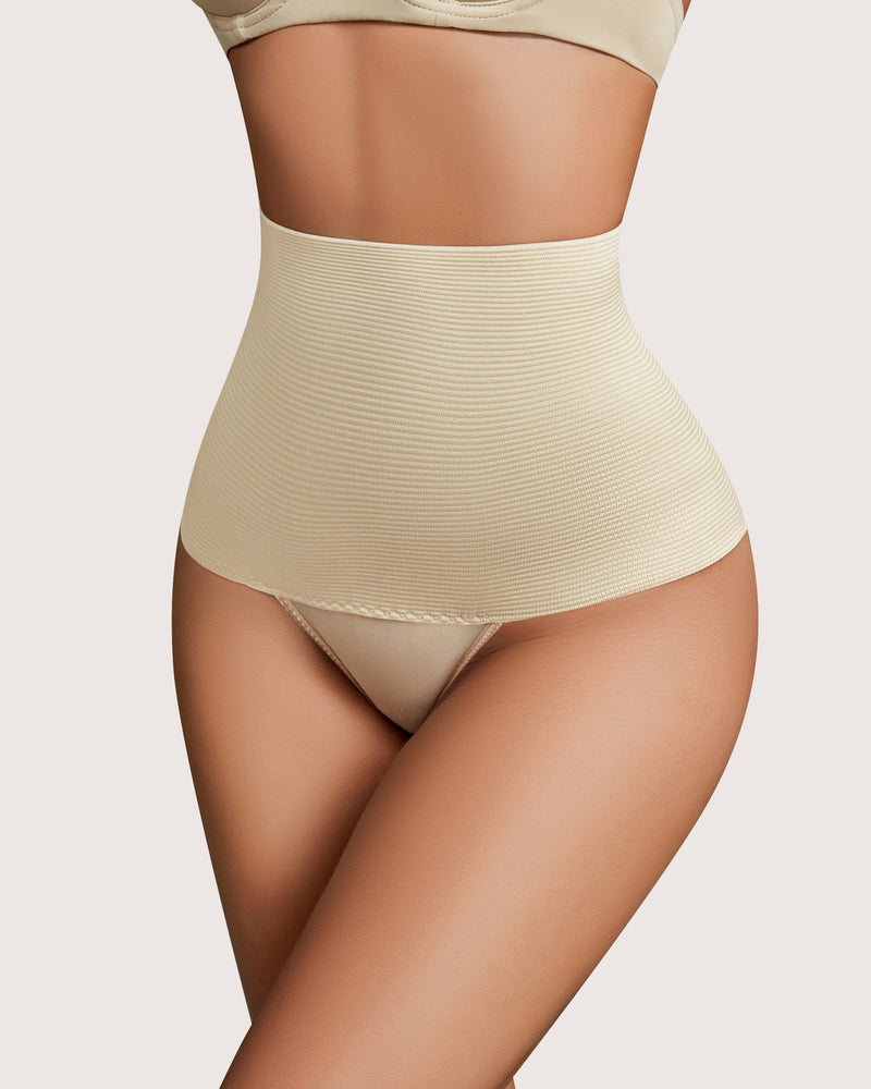 High-waisted beige thong shapewear for tummy control, enhancing the natural hourglass figure.