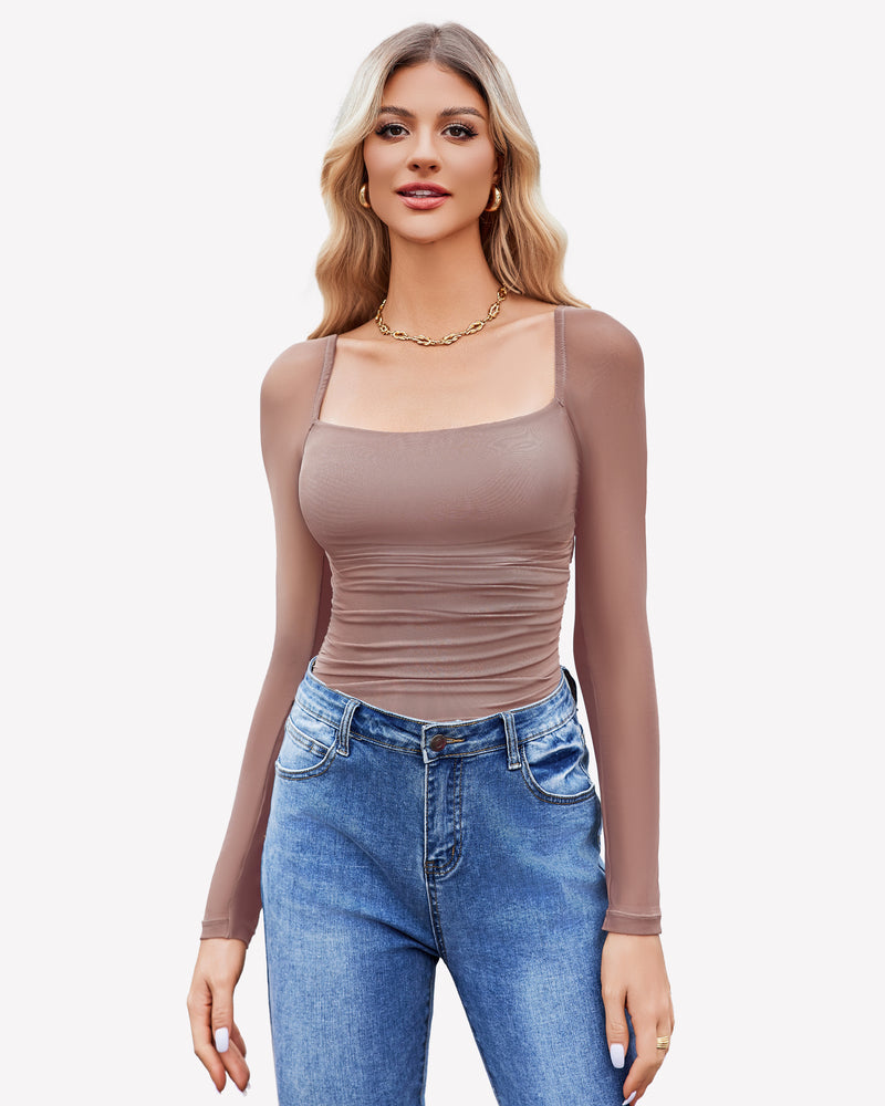 Square neck mesh bodysuit, taupe with long sleeves, ruched detail; model in jeans & gold jewelry.